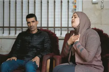  ?? MAYA ALLERUZZO/AP ?? Saleh Manasra, left, and Maysoon Manasra are the parents of Ahmad Manasra, imprisoned by Israel since he was 14 when he was convicted of attempted murder. Speaking of her son, Maysoon said the “prison only offered pain.”