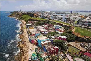  ?? Ricardo Arduengo/Associated Press ?? An aerial view of the La Perla neighborho­od in San Juan, Puerto Rico.