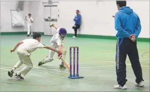  ?? Picture: Chris Davey FM4687609 ?? Street End’s Harry Beer attempts to run out Whitstable’s Leo Sharp during the under-13 match at the Kent Cricket Academy on Saturday