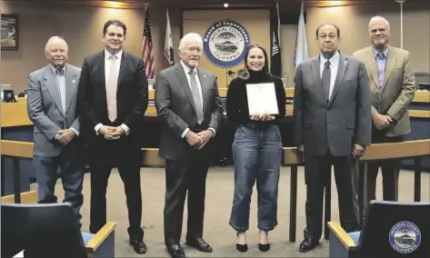  ?? PHOTO COURTESY OF IMPERIAL COUNTY EXECUTIVE OFFICE ?? Kristin O’Lear is pictured with the Board of Supervisor­s.