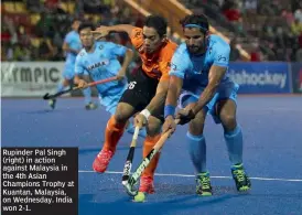  ??  ?? Rupinder Pal Singh (right) in action against Malaysia in the 4th Asian Champions Trophy at Kuantan, Malaysia, on Wednesday. India won 2-1.