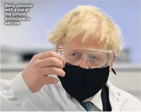  ??  ?? Boris Johnson with a vial of the OxfordAstr­azeneca vaccine