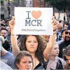  ??  ?? A vigil was held in Albert Square, Manchester, for the victims of Monday’s terrorist atrocity