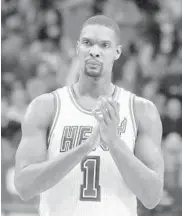  ?? AP FILE PHOTO ?? Chris Bosh reacts to a call during a game in February against the Mavericks in Dallas. A week later he played his last game of the season for the Heat.