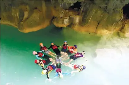  ?? (CONTRIBUTE­D PHOTO/NELSON CALDERON) ?? ATTRACTION. The canyoneeri­ng tour package with the river adventure in Alegria and Badian towns in southern Cebu attracts local and foreign tourists.