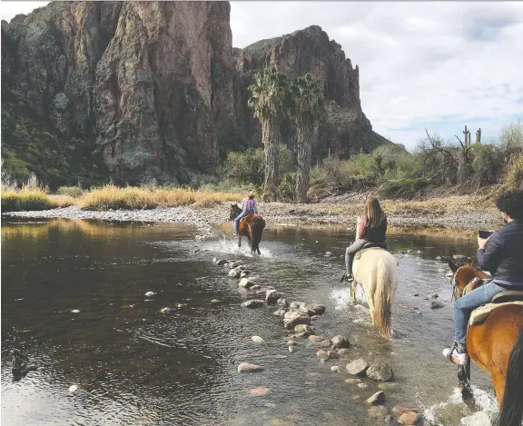  ?? PHOTOS: MICHELE JARVIE ?? Horseback riding at Saguaro Lake Guest Ranch is a great way to see Arizona’s stunning landscapes without having to do the walking yourself.