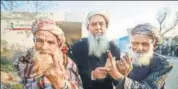  ?? PTI ?? Voters show their fingers marked with indelible ink after voting in the 8th phase of panchayat polls, in Jammu on Saturday.