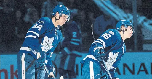  ?? MARK BLINCH/GETTY IMAGES ?? Auston Matthews, left, and Mitch Marner remain the key building blocks for the Leafs, who might want to sign them to extensions sooner rather than later.