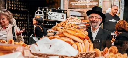  ??  ?? The famous Mahane Yehuda Market in downtown Jerusalem.