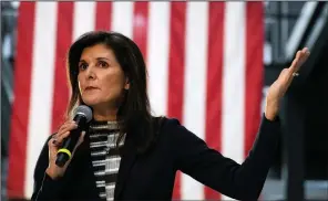  ?? (File Photo/ap/charlie Neibergall) ?? Republican presidenti­al candidate Nikki Haley speaks to voters Monday during a town hall campaign event in Urbandale, Iowa. Stories circulatin­g online incorrectl­y claim Haley “changed” her name for political reasons.