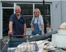  ??  ?? Michael and Alison Panting renovating their new shop in Knock before the papal visit