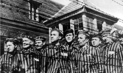  ??  ?? A long way from our ‘warm houses’ … prisoners at Auschwitz. Photograph: Rex Features