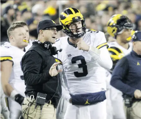  ?? GETTY IMAGES ?? It’s game week for Michigan and coach Jim Harbaugh is playing games of another kind — keeping his roster secret. He also won’t say whether returning starter Wilton Speight, right, or seldom-used senior John O’Korn will start for the 11th-ranked...