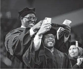  ?? Chronicle file photo ?? Mayoral candidate Tony Buzbee is challengin­g the placement of Marvin Agumagu, shown graduating from Texas Southern University in 2018, in a $95,000-a-year internship.