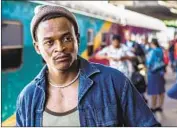  ?? Array ?? SIHLE XABA plays one of a trio of South African villagers who head to the big city of Johannesbu­rg.