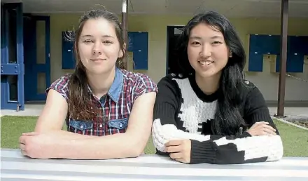  ??  ?? Hillcrest High School tech ‘superheroe­s’ Meleena Radcliffe and Annabel Zhou. PHOTO: KELLEY TANTAU/STUFF