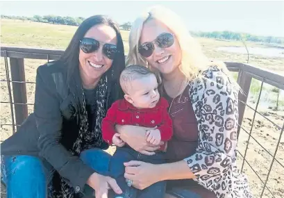  ?? FACEBOOK TRIBUNE NEWS SERVICE ?? Ashleigh Coulter, 28, and her wife, Bliss Coutler, 36, made medical history after they took turns carrying their son, Stetson.