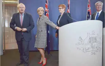  ?? — AFP ?? Britain’s Foreign Secretary Boris Johnson (L), Australia’s Foreign Minister Julie Bishop (2nd L), Australia’s Defence Minister Marise Payne (2nd R) and Britain’s Defence Minister Michael Fallon (R) attend a press conference in Sydney on Thursday.