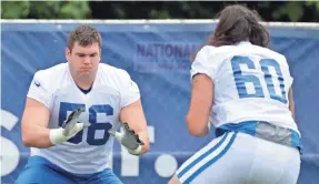  ?? MICHAEL CONROY/AP ?? Colts offensive guard Quenton Nelson (56), taken sixth overall in the draft, works on technique during the first week of training camp.