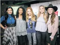  ??  ?? In this Jan. 29 photo provided by Song Suffragett­es, Inc., members of the Song Suffragett­es, from left, Candi Carpenter, Tiera Leftwich, Kalie Shorr, Chloe Gilligan and Jenna Paulette pose for a photo in Nashville, Tenn. Female musicians in Nashville...