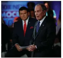  ?? (AP/Carolyn Kaster) ?? Democratic presidenti­al candidate Mike Bloomberg speaks Monday at a Fox News Channel event, moderated by Fox’s Martha MacCallum (not pictured) and Bret Baier (left), at the Hylton Performing Arts Center in Manassas, Va.