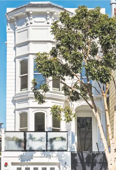  ??  ?? Above: Striking tile work is found throughout the updated interior, as evidenced by this powder room. Right: 837 S. Van Ness Ave. in the Mission District is a reimagined Italianate Victorian available for $3.995 million.