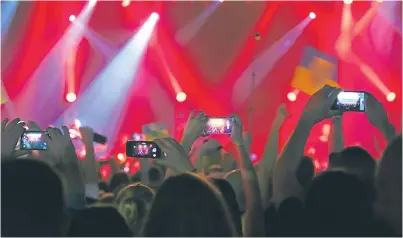  ??  ?? Surely concert-goers should be enjoying the gig rather than filming it.