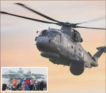  ??  ?? AIRBORNE a Merlin Crowsnest helicopter, which was launched for the first time from HMS Queen Elizabeth leaves Portsmouth, pictured leaving Portsmouth on May 1