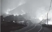  ?? NIC COURY AP ?? High winds cause the Colorado Fire burns along Highway 1 near Big Sur, California, on Saturday.