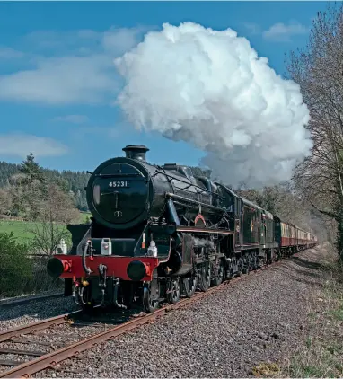  ??  ?? Still in England between Bucknell and Knighton, ‘Black Five' No. 45231 climbs towards Knighton while hauling a private special towards Carmarthen on April 2.