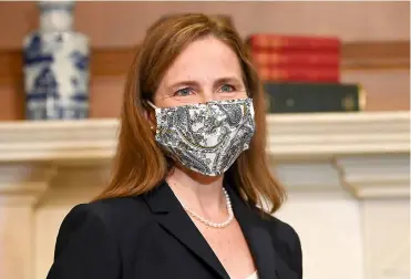  ?? PHOTO AFP ?? La juge Amy Coney Barrett a été nommée par le président américain Donald Trump pour remplacer l’icône féministe Ruth Bader Ginsburg à la Cour suprême des États-unis.