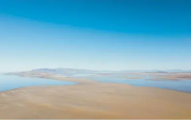  ?? BRYAN TARNOWSKI/THE NEW YORK TIMES ?? The Great Salt Lake in Utah, seen in March, has already lost two-thirds of its surface area.