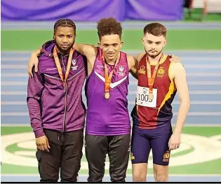  ?? ?? Joel Mattacks (right) with his 60m bronze medal at the British Universiti­es Indoor Championsh­ips