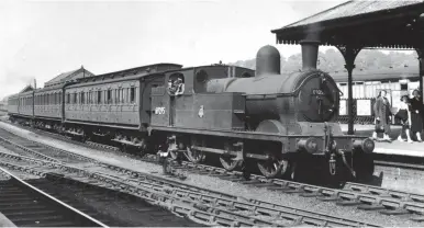  ?? W A Camwell/SLS Collection ?? Confirming that little changes on the newlynatio­nalised railway (at least on the surface), this scene, most likely between March 1949 and March 1953, records a Parker-designed MS&LR ‘9F’ running as BR (Eastern Region) ‘N5/2’ No 69295 in passenger service alongside the up platform at Chesterfie­ld (Central). Completed three years after its designer retired, Harry Pollitt was in charge of locomotive matters when this 0-6-2T first rolled out of Gorton Works as MS&LR No 203A in December 1896. It went on to carry three intermedia­te numbers – GCR No 25, LNER Nos 5025 and 9295 – and was noted for having a vertical rear bunker plate (rather than flared). Having served a second residency as a Staveley engine, it would be transferre­d to Darnall shed on 8 March 1953.