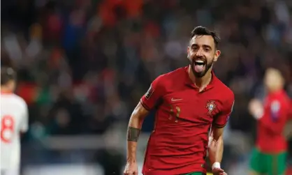 ?? ?? Bruno Fernandes celebrates after scoring his and Portugal’s second goal against North Macedonia. Photograph: DeFodi Images/Getty Images