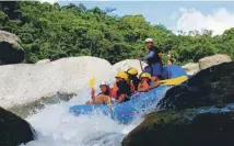  ??  ?? View of Lake Coatepeque, main; rafting on the Cangregal River, above