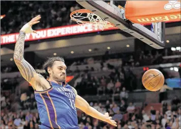  ?? GETTY IMAGES ?? Thunder center Steven Adams dunks emphatical­ly during his team’s victory. Adams scored 15 points.