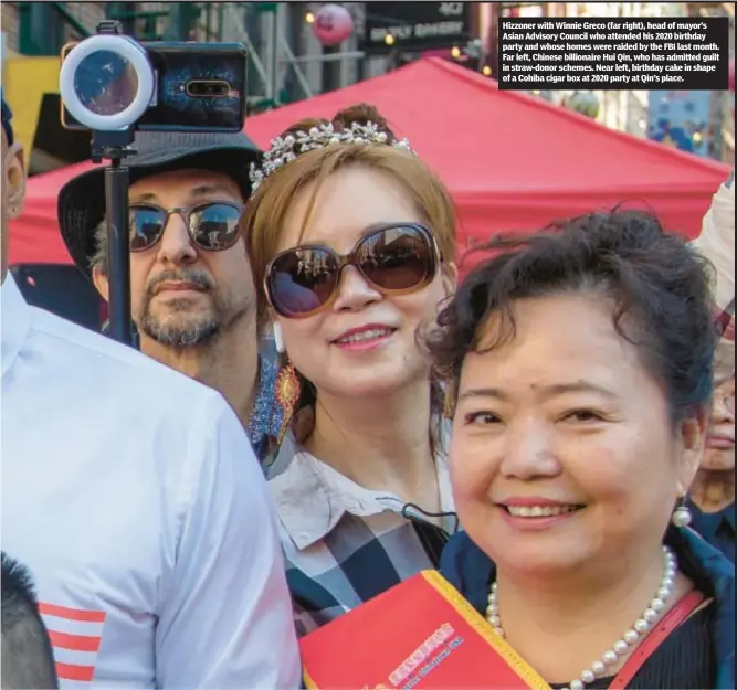  ?? ?? Hizzoner with Winnie Greco (far right), head of mayor’s Asian Advisory Council who attended his 2020 birthday party and whose homes were raided by the FBI last month. Far left, Chinese billionair­e Hui Qin, who has admitted guilt in straw-donor schemes. Near left, birthday cake in shape of a Cohiba cigar box at 2020 party at Qin’s place.