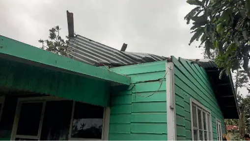  ??  ?? A house damaged by Cyclone Gita, which is being described as the worst tropical storm to have hit Tonga in six decades.