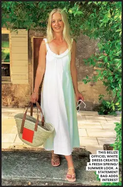  ??  ?? THIS BELIZE OFFICIEL WHITE DRESS CREATES A FRESH SPRING/ SUMMER LOOK. A STATEMENT BAG ADDS INTEREST