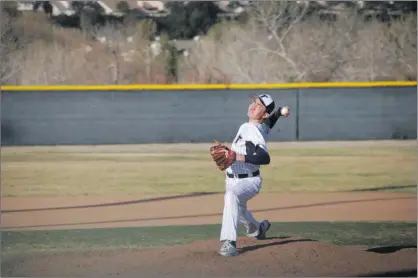  ?? Courtesy photo ?? Trinity freshman pitcher Luke Pfeiffer delivers a pitch in the Knights’ 9-2 win over Vasquez on Thursday at Hart Baseball Complex.