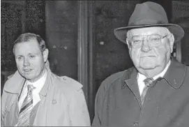  ?? | SUN-TIMES LIBRARY ?? Defense attorney Dan Webb and former Gov. George Ryan leave the Dirksen Federal Building in 2006.