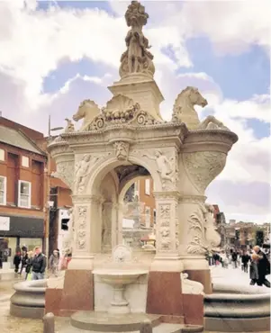  ??  ?? > The restored Dudley Fountain is back to it best thanks to a council project