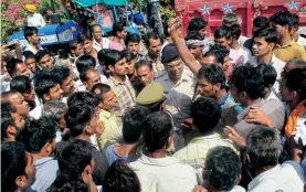  ??  ?? BAD SEEDS Farmers protesting at the Agar mandi, Agar Malwa district