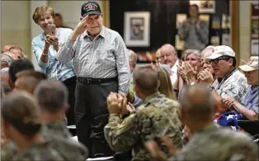  ?? JONATHAN QUILTER / THE COLUMBUS DISPATCH ?? World War II veteran Wayne Morr, 93, of Beavercree­k, salutes the crowd as he was acknowledg­ed during the 229th birthday celebratio­n of the Ohio National Guard on Tuesday in Dublin.