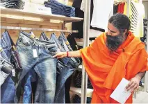  ?? SOURCE: TWITTER ?? Ramdev at the launch of Patanjali Paridhan store in New Delhi earlier this week