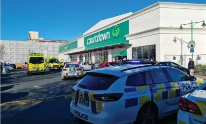  ?? Photograph: Arthur Taylor/Facebook ?? New Zealand police respond to a stabbing attack at a Countdown supermarke­t in the city of Dunedin