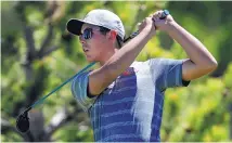  ?? JIM THOMPSON/JOURNAL ?? Taos’ Josh Fambro, who watches his tee shot, won the Class 1A-4A individual state title by three strokes at Canyon Club on Tuesday.