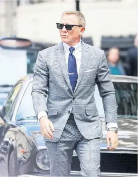  ?? CONTRIBUTE­D ?? British agent, James Bond (Daniel Craig) in a scene from the movie, ‘No Time to Die’.