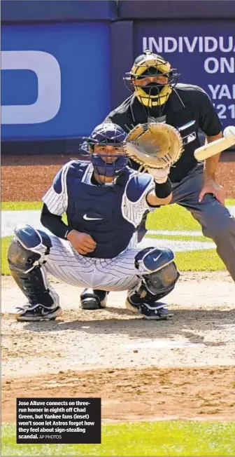  ?? AP PHOTOS ?? Jose Altuve connects on threerun homer in eighth off Chad Green, but Yankee fans (inset) won’t soon let Astros forget how they feel about sign-stealing scandal.